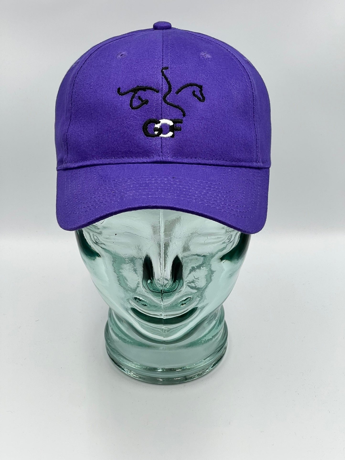 Purple cap with black design