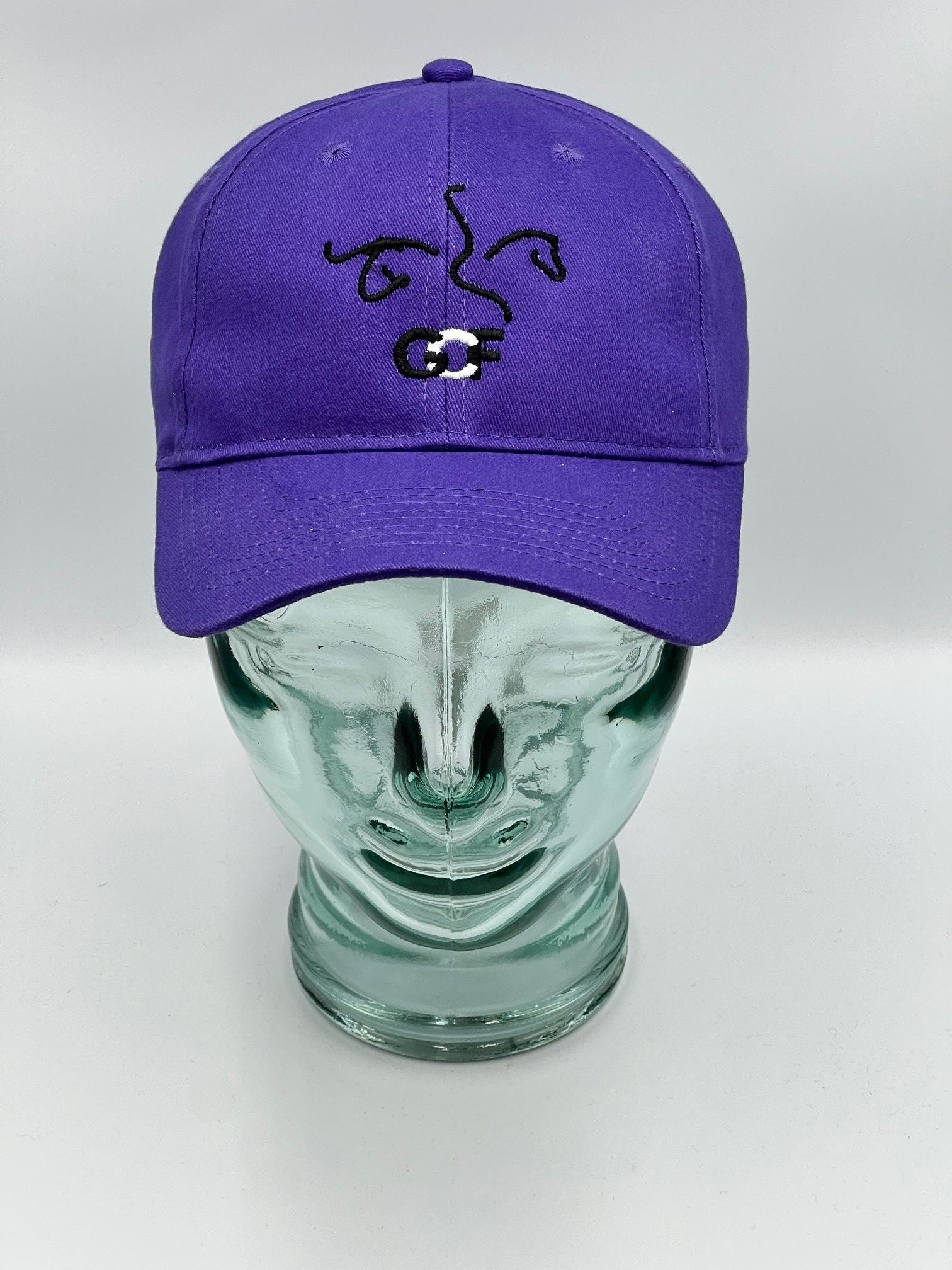 Purple cap with black design