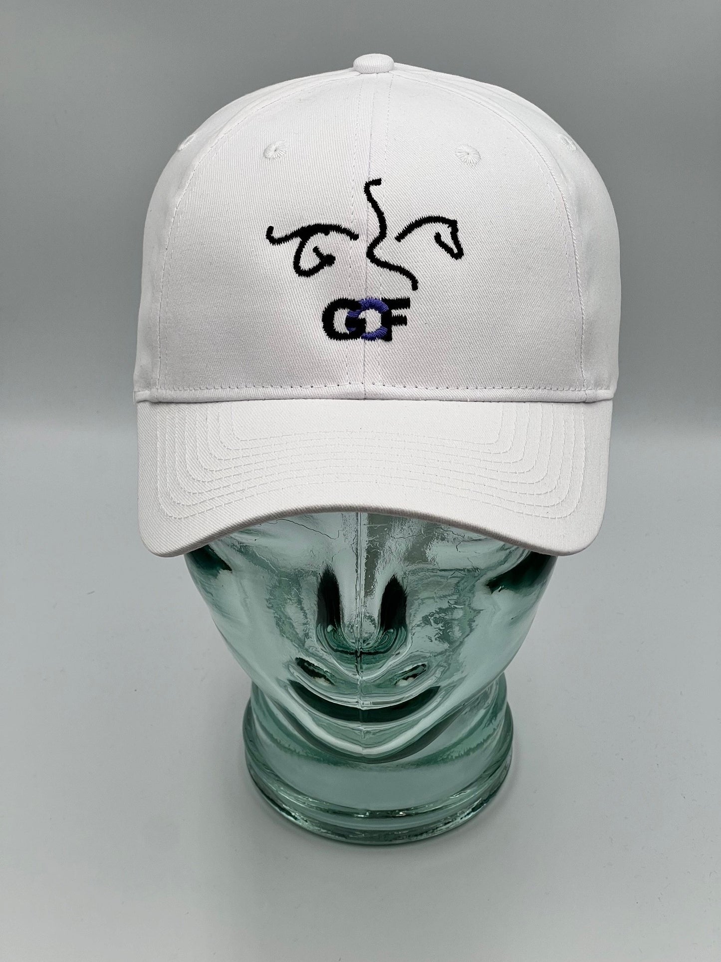 White cap with black GCF embroidered design